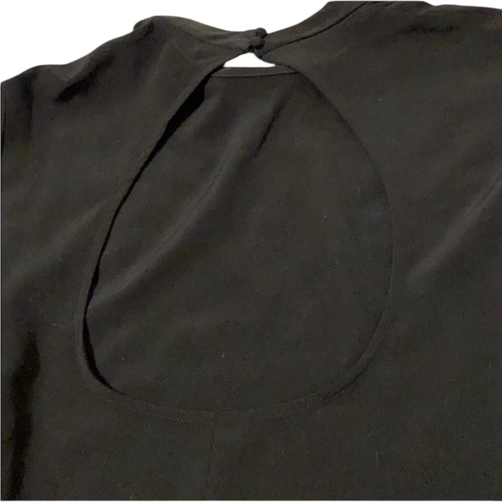 H&M size large black open back satiny like back of neck button flowy sleeve